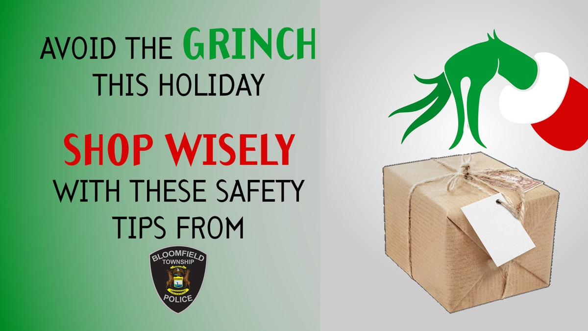 A Christmas gift with a Grinch hand above it for Bloomfield Township Police Department's holiday shopping safety tips. 