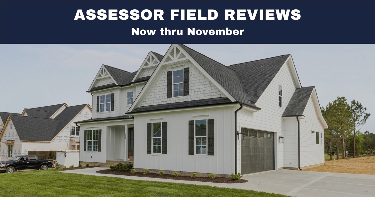 A newly constructed home with message that reads Assessor Field Reviews Now thru November