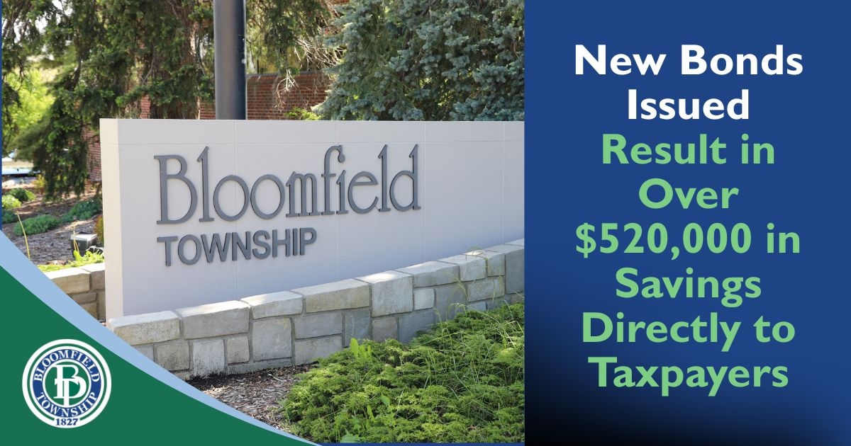 The Bloomfield Township gateway sign with message "New Bonds Issued Result in Over $520,000 in Savings Directly to Taxpayers"